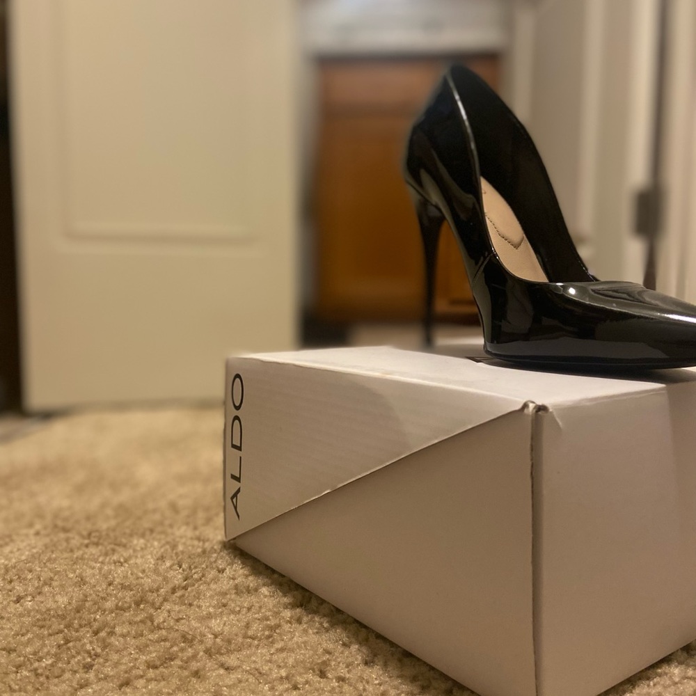 Black patent leather heels.
